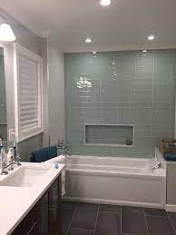 Well you're in luck, because here they come. My New Master Bathroom Shower Area Love My Green Glass Accent Wall Tile Accent Wall Blue Shower Tile Glass Tile Shower