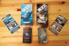 Is a cooperative card game inspired by escape rooms that uses a simple system which allows you to search scenes, combine objects, and solve riddles. Unlock Escape Room Card Game Review Co Op Board Games