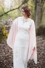 A velvet over dress completes the elven inspired look. Magical Elvish Wedding Unconventional Wedding