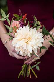 These petite wedding bouquets will have you considering a small bridal arrangement. Elegant Burgundy Wedding At The New York Botanical Garden Bridesmaid Flowers Simple Simple Wedding Bouquets Rustic Simple Wedding Bouquets