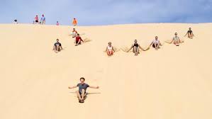 One of the most unique port stephens things to do is jump on a camel at birubi beach, and ride through the sand dunes and right up to the ocean. Sand Boarding Adventures With The Kids At Stockton Sand Dunes Ellaslist