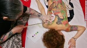 Muscle your way into the top 91 best cool arm tattoos. What Tattoos Really Do To Our Bodies Immune Systems Cnn