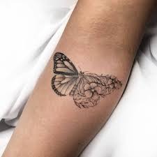 The skull butterfly tattoo is perfect to describe life's fleeting journey. Fine Line Half Butterfly Half Flower Tattoo On The