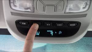 Locate the homelink garage door buttons. How To Program Your Homelink Car Garage Door Opener Toyota Ford Chevy Youtube