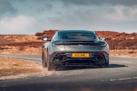 Nowhere is the difference between aston martin and ferrari so apparent than in the eye test of the roma and db11 v8 coupe. Ferrari Roma Vs Porsche 911 Turbo S Vs Aston Martin Db11 Amr 2021 Group Test Car Magazine