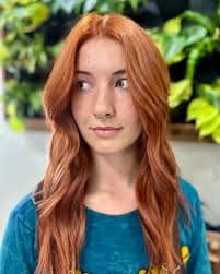 A violet root with a peachy, orange, pink mix