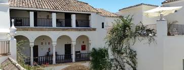 Comprising of 27 traditional houses it has 134 different rooms which are linked through 40 patios, gardens and a labyrinth of small passageways. Las Casas De La Juderia De Cordoba Hotel Gay Friendly Hotel