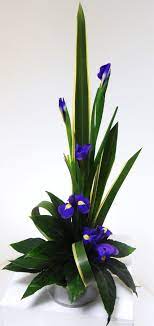 Linear Iris Arrangement Creative Flower Arrangements Modern Flower Arrangements White Flower Arrangements