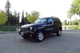 Image result for Brilliant Black 2003 Jeep