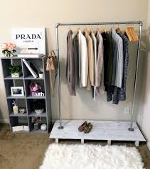 Use this corner rack to simplify your morning routine. How To Build A Standing Clothing Rack For Under 50 Dani Thompson Chic Capsule Closet