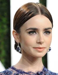 Bridesmaids Low Bun Big Earrings Google Search Sleek Bun Hairstyles Sleek Bun Bun Hairstyles