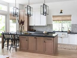 Staining your cabinets an unexpected color is a terrific way to put a custom touch on your kitchen cabinetry. Kitchen Trend Wood Stained And Painted Cabinets Home Bunch Interior Design Ideas