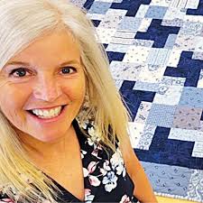 Donna's Free "Starry Log Cabin" Quilt pattern with Jordan Fabrics