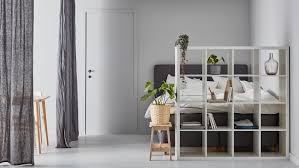 For this ikea room divider hack, all you have to do is rotate a shelving unit so that it is perpendicular to the wall. Room Dividers Ikea