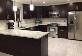 Cherry wood is a beautiful darker wood that looks phenomenal when used for kitchen cabinets. Espresso Shaker Kitchen Cabinets Denver Custom Cabinetry Stone International