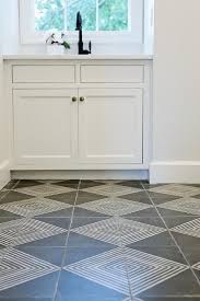 Beautiful Gray And White Laundry Room Features White And Gray Diamond Pattern Floor Tiles Leading To White C Laundry Room Tile Room Tiles Laundry Room Flooring
