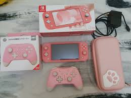 Nintendo switch lite is a compact, lightweight nintendo switch system dedicated to handheld play. Nintendo Switch Lite Coral Pink Video Gaming Video Game Consoles Nintendo On Carousell