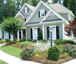 Houzzers ready to repaint their home exteriors get custom color advice from a design pro. Olive Green Tan Roof House House Paint Exterior Exterior Paint Colors For House Green House Exterior