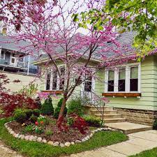 Repeat a hue throughout front yard flower beds and even on porch planters or hanging baskets and you'll subtly direct the eye. Front Yard Landscaping Ideas For Curb Appeal Houselogic