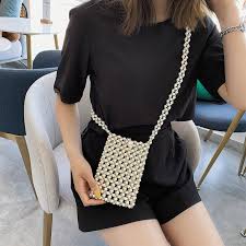 Welcome to yyw.com for our fashion women boho handmade bag. Handmade Woven Beaded Pearl Clutch Tote Messenger Bag Waamii