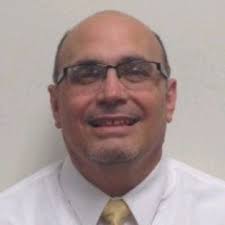 Terry Kestner, ARA, RPRA, hands off the ASFMRA Appraiser of the Year Award  to the exemplary Chris Greenwalt, ARA, RPRA. Congratulations, Chris! And  thanks to Rabo AgriFinance for sponsoring this…