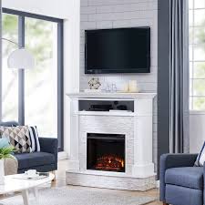 The oversized pillars of the fireplace open to reveal hidden storage compartments, with. Ashfield White Faux Stone Electric Fireplace With Storage On Sale Overstock 23435183