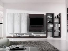 Since the frame of the tv is white which may look subtle on this large white wall, a small black tv back panel is installed. Cool Tv Room Decorating Ideas Small Living Rooms Living Room Tv Living Room Tv Wall