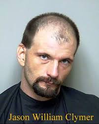 Deputies find man hiding in attic when serving warrant