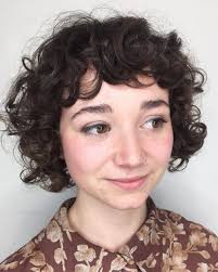 An orange hair shade and straight bangs will last for long if perfectly styled. Short Bob With Bangs Curly Hair Novocom Top