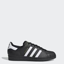 Black Adidas Shoes With Gold Pin On Boss