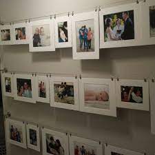 Photo Gallery Wall Using Ikea Dignitet Curtain Wire White Photo Mats And Picture Clips Planning To Photo Wall Gallery Art Display Wall Picture Gallery Wall