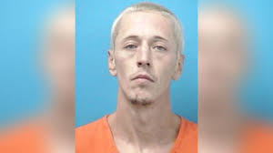 Attempted murder suspect back behind bars after exhausting manhunt