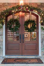 Easy Trick To Hanging Door Wreaths With Ribbon Bluegraygal Door Wreath Hanger Christmas Front Doors Christmas Porch