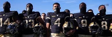 College football army player headbutts coach. P556u7k171kbwm