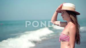 Check spelling or type a new query. Attractive Woman In Bikini Staying At Th Stock Video Pond5