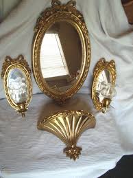 Vintage home interior oval wooden and cast iron candlestick sconces, pair of wall mounted homco candle holders. Home Interiors Mirror Sconces Shelf And Votive Cups Grouping Set 1806429209