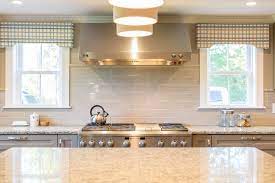 Options include ceramic or glass tiles, full slabs of a material, or even vinyl wallpaper. Porcelain Or Ceramic Tile Best Kitchen Backsplash Materials Explained