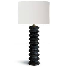 Caldwell Black Accordion Wood Table Lamp The elegant lines of the durable powder coated aluminium pole pull your gaze 2.2m up to the stunning glass panels on top.