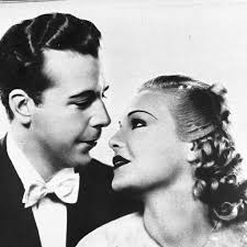 I've Got My Love To Keep Me Warm" from On the Avenue (1937). Music and  lyrics by Irving Berlin. Musical number staged by Seymour Felix. Performed  by Dick Powell and Alice Faye.