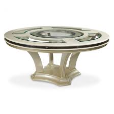 Hollywood swank brings the influence of movie premieres to life with mirrors, tufted leather accents, and mirrored panels. Round Dining Table Pearl Caviar Hollywood Swank Collection By Michael Amini