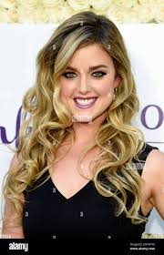 Actress Ashley Newbrough poses at the Crown Media Family Networks  Television Critics Association party