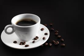 Black coffee in white coffee cup and ...