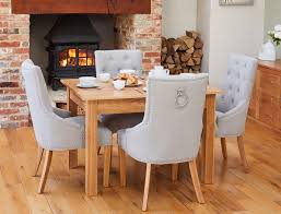 Get free shipping on qualified fabric dining chairs or buy online pick up in store today in the furniture department. Baumhaus Mobel Oak Dining Table And 4 Accent Grey Fabric Dining Chairs Cfs Furniture Uk