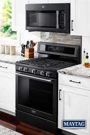 Maytag Cast Iron Black Kitchen Appliances A New Finish That S As Tough As It Is Timeless Home Kitchens Kitchen Black Appliances Kitchen