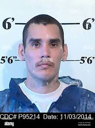 This Nov. 3, 2014, photo provided by the California Department of  Corrections and Rehabilitation shows Edward Cisneros. Officials say  Cisneros and Raul Alvarado assaulted Danny Roman, 64,