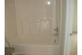 How To Paint Over A Fiberglass Shower Surround Hunker Fiberglass Shower Stalls Fiberglass Shower Shower Tub