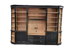 Grande Bibliotheque En Bois Massif Arrondie Ou Ceintree Comportant Un Espace Pour La Tv Ce Meuble D Etagere Salon Grande Bibliotheque Rangement Entree Maison