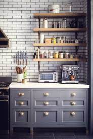 • put your mirror opposite a window in the bedroom, living room or dining room to make the most of natural light. Grey Kitchen With Brass Hardware