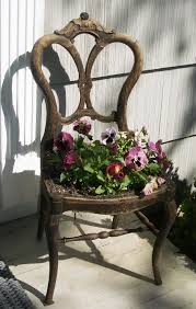 Pin By Kat Alford On Gardening Chair Planter Garden Chairs Design Garden Chairs