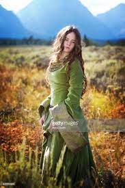 Full Length Of Woman With Long Brown Hair In Green Medieval Princess Medieval Princess Girl In Field Medieval Girl